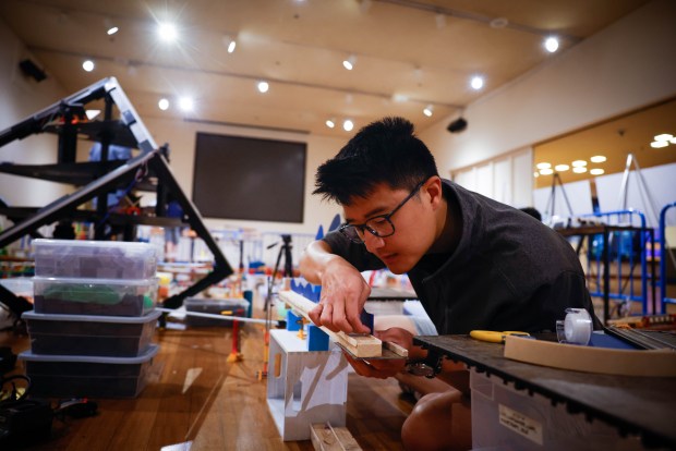 The team lead Alex Huang, a transport engineer from San Jose, works on The Tech Topple: The Great Adventure at The Tech Interactive in San Jose, Calif., on Thursday, July 16, 2026. (Shae Hammond/Bay Area News Group)