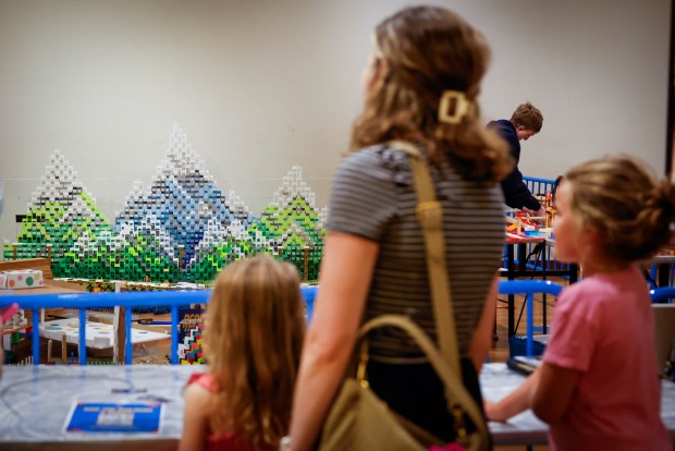 Visitors look at The Tech Topple: The Great Adventure being built at The Tech Interactive in San Jose, Calif., on Thursday, July 16, 2026. (Shae Hammond/Bay Area News Group)