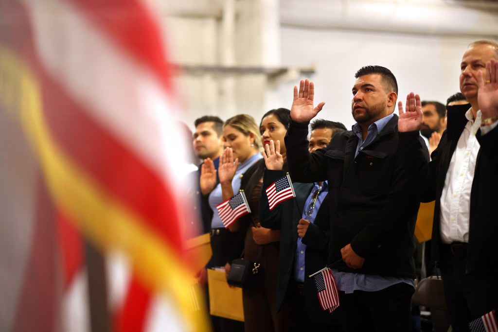 Aboard Alameda’s USS Hornet, 76 immigrants become U.S. citizens ahead of America’s 250th birthday