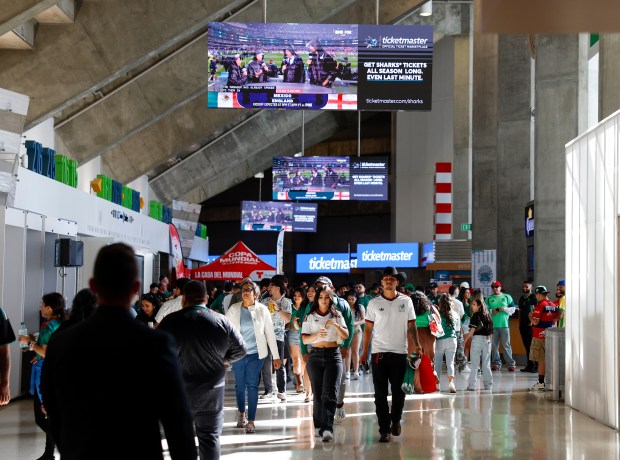 Mexico fans wander the concourse at the SAP Center before the Mexico versus England Round of 16 match for the FIFA World Cup at the Soccer Celebration presented by the San José Sports Authority at the SAP Center in San Jose, Calif., on Sunday, July 5, 2026. (Nhat V. Meyer/Bay Area News Group)