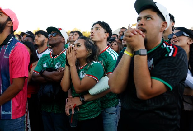 Mexico soccer fans watch the Mexico versus England Round of 16 match late in the second half for the FIFA World Cup at the Soccer Celebration presented by El Camino, hosted by the San Jose Earthquakes and San José Sports Authority at the Discovery Meadow in San Jose, Calif., on Sunday, July 5, 2026. (Nhat V. Meyer/Bay Area News Group)
