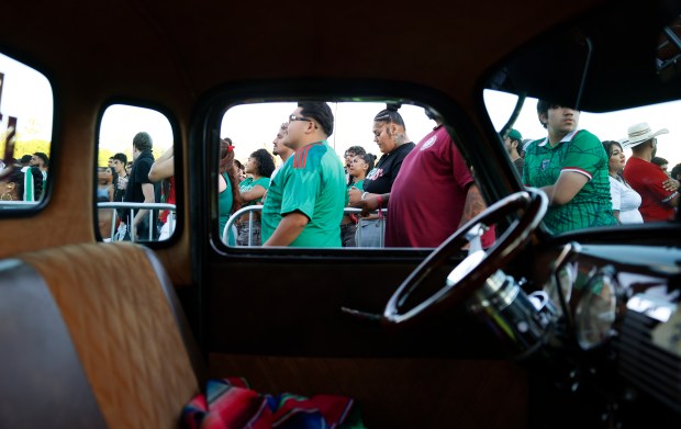 Soccer fans watch the Mexico versus England Round of 16 match in the second half for the FIFA World Cup at the Soccer Celebration presented by El Camino, hosted by the San Jose Earthquakes and San José Sports Authority at the Discovery Meadow in San Jose, Calif., on Sunday, July 5, 2026. (Nhat V. Meyer/Bay Area News Group)