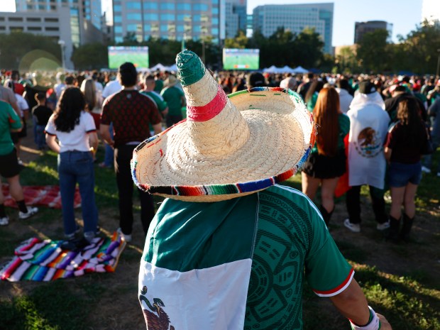 Soccer fans watch the Mexico versus England Round of 16 match in the second half for the FIFA World Cup at the Soccer Celebration presented by El Camino, hosted by the San Jose Earthquakes and San José Sports Authority at the Discovery Meadow in San Jose, Calif., on Sunday, July 5, 2026. (Nhat V. Meyer/Bay Area News Group)