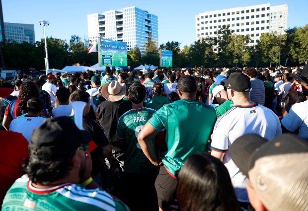 Soccer fans watch the Mexico versus England Round of 16 match in the second half for the FIFA World Cup at the Soccer Celebration presented by El Camino, hosted by the San Jose Earthquakes and San José Sports Authority at the Discovery Meadow in San Jose, Calif., on Sunday, July 5, 2026. (Nhat V. Meyer/Bay Area News Group)
