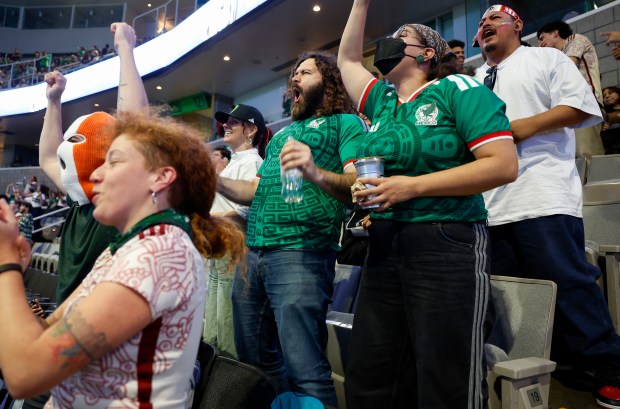 Mexico soccer fans, including Aaron Burns, from San Jose, celebrate a goal during the Mexico versus England Round of 16 match in the first half for the FIFA World Cup at the Soccer Celebration presented by the San José Sports Authority at the SAP Center in San Jose, Calif., on Sunday, July 5, 2026. (Nhat V. Meyer/Bay Area News Group)