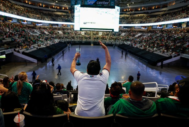 Soccer fans react to a play as they watch the Mexico versus England Round of 16 match in the first half for the FIFA World Cup at the Soccer Celebration presented by the San José Sports Authority at the SAP Center in San Jose, Calif., on Sunday, July 5, 2026. (Nhat V. Meyer/Bay Area News Group)