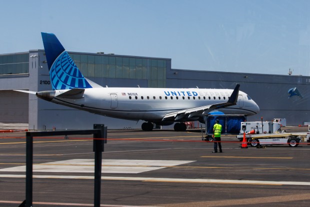 A United Express airplane moves toward the runway to take off from the McClellan-Palomar Airport in Carlsbad on Wednesday, July 15, 2026. (Kristian Carreon / The San Diego Union-Tribune)