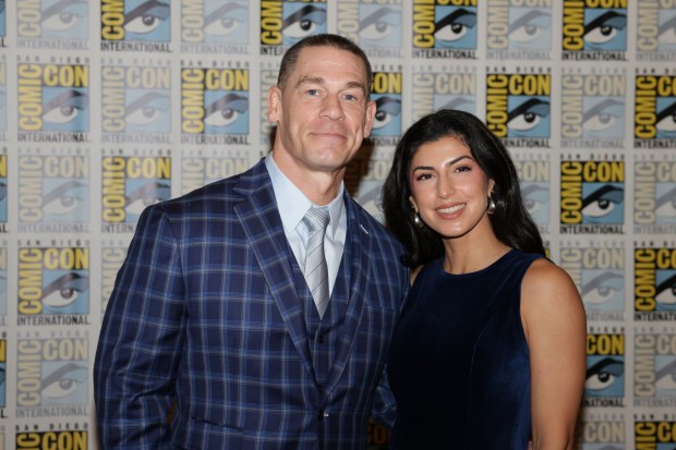 John Cena, left, and Shay Shariatzadeh arrive at the Apple TV press line to promote "Matchbox the Movie" during Comic-Con International on Saturday, July 25, 2026, in San Diego. (Photo by Andrew Park/Invision/AP)