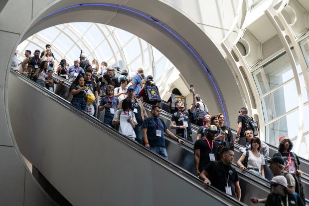 San Diego, CA - People pack the escalator in the Convention Center during Comic-Con on Saturday, July 25, 2026, in San Diego, CA. (Luke Johnson / The San Diego Union-Tribune)