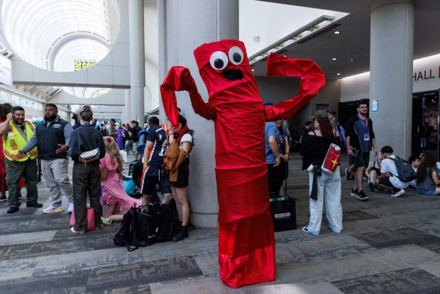 San Diego, California - A person cosplays as an inflatable tube man during Comic-Con on Saturday, July 25, 2026. (Kristian Carreon / The San Diego Union-Tribune)