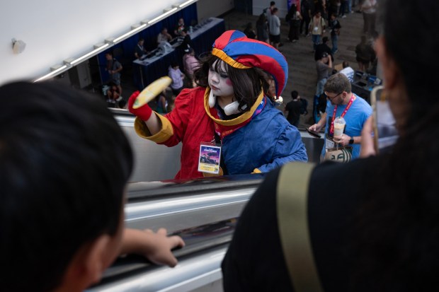 San Diego, CA - People pack the escalator in the Convention Center during Comic-Con on Saturday, July 25, 2026, in San Diego, CA. (Luke Johnson / The San Diego Union-Tribune)