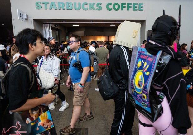 San Diego, CA - People pack the Convention Center Lobby during Comic-Con on Saturday, July 25, 2026, in San Diego, CA. (Luke Johnson / The San Diego Union-Tribune)