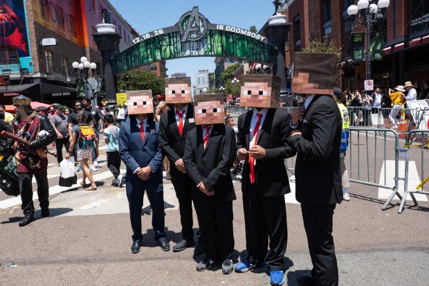 San Diego, CA - A group dressed as "Steve" from Minecraft stand in the Gaslamp during Comic-Con on Saturday, July 25, 2026, in San Diego, CA. (Luke Johnson / The San Diego Union-Tribune)