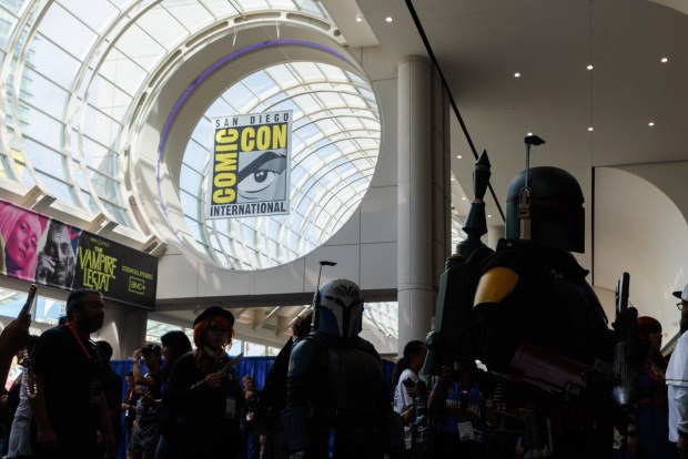 San Diego, California - Attendees walk through the convention center during Comic-Con on Saturday, July 25, 2026. (Kristian Carreon / The San Diego Union-Tribune)