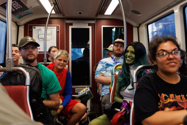 San Diego, California - Attendees take the trolley during Comic-Con on Saturday, July 25, 2026. (Kristian Carreon / The San Diego Union-Tribune)