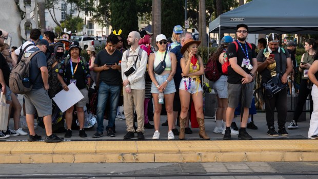 San Diego, CA - People crowd the Seaport Village trolley stop during Comic-Con on Saturday, July 25, 2026, in San Diego, CA. (Luke Johnson / The San Diego Union-Tribune)