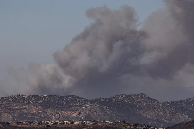 La Mesa, CA - The Creelman Fire expands rapidly in Ramona on Wednesday, July 22, 2026, as seen from La Mesa, CA. (Luke Johnson / The San Diego Union-Tribune)