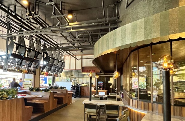 The interior of the former food hall was gutted and redesigned with a more elevated look. (Lori Weisberg /The San Diego Union-Tribune.