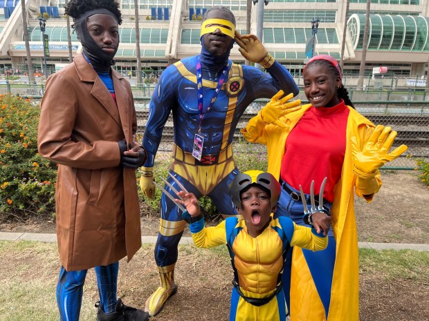 The Ford Family from Atlanta, George, showed of their X-Men cosplay outside the San Diego Convention Center Friday. (Abby Hamblin / The San Diego Union-Tribune)
