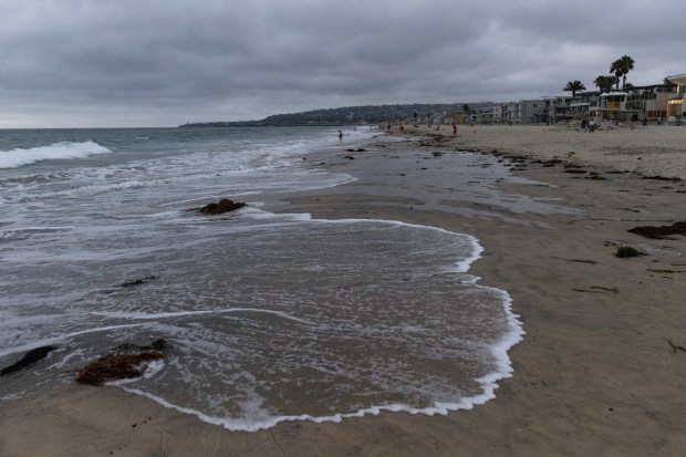 San Diego, CA - A king tide rolls in at Mission Beach on Monday, July 13, 2026, in San Diego, CA. (Luke Johnson / The San Diego Union-Tribune)