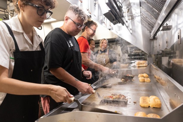 San Diego, CA - Food journalists and influencers make the new Philly Cheesesteak at the Jack in the Box headquarters on Wednesday, July 15, 2026, in San Diego, CA. (Luke Johnson / The San Diego Union-Tribune)