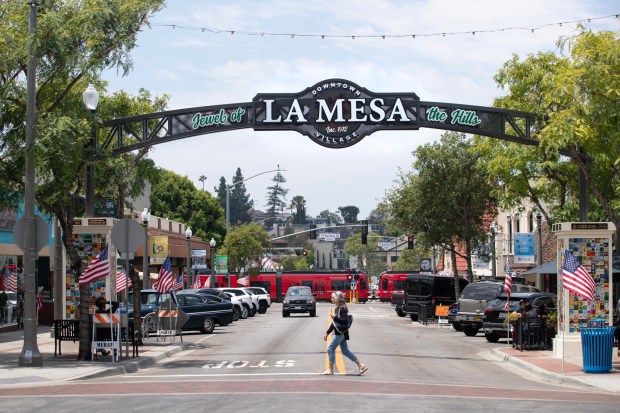 The La Mesa sign in downtown on Grossmont Boulevard in June. (Luke Johnson / The San Diego Union-Tribune)