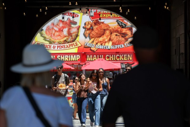 A tunnel from the Paddock area leads to the food area during the San Diego County Fair's final day in Del Mar on Sunday, July 05, 2026. (Hayne Palmour IV / For The San Diego Union-Tribune)