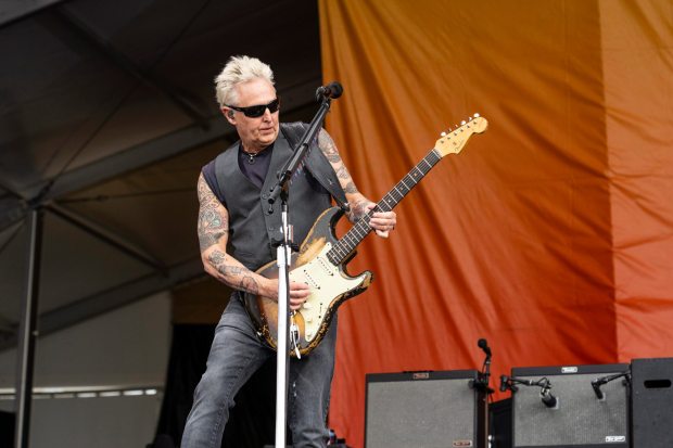 Mike McCready of Pearl Jam performs during the second weekend of the New Orleans Jazz & Heritage Festival. He'll be at Comic-Con to talk about his new graphic novel. (Amy Harris/Invision/AP)