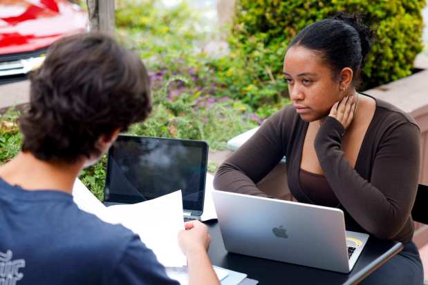 Nikhil Plettner Booker and Ashley Ordaz plan for their later discussion with Sheriff Kelly Martinez on Tuesday, July 14, 2026, in San Diego. (Meg McLaughlin / The San Diego Union-Tribune)