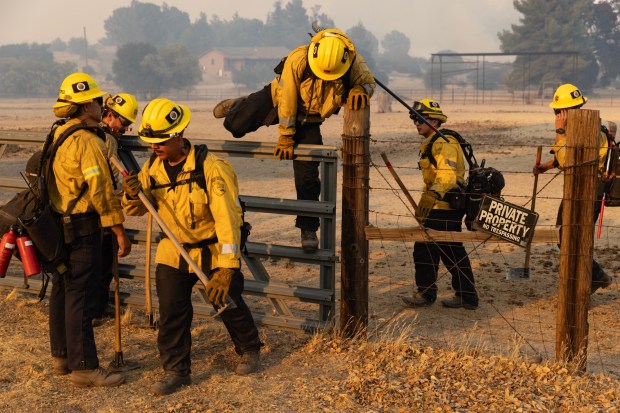 Boulevard, CA - Crews battle the Thorn Fire off of Ribbonwood Road north of I-8, which has grown rapidly on Wednesday, July 15, 2026, in Boulevard, CA. The (Luke Johnson / The San Diego Union-Tribune)