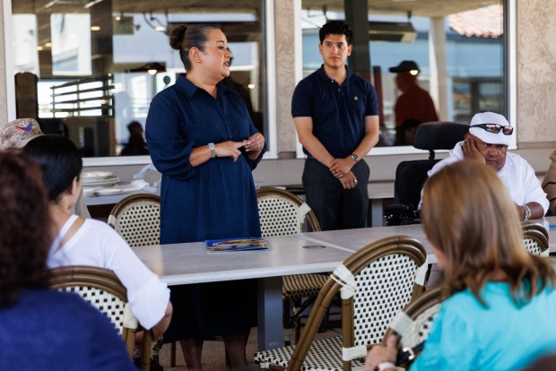 Councilmember Vivian Moreno speaks to members of Friends of San Ysidro during a meeting at IHOP in San Ysidro on Thursday, June 25, 2026. (Kristian Carreon / The San Diego Union-Tribune)