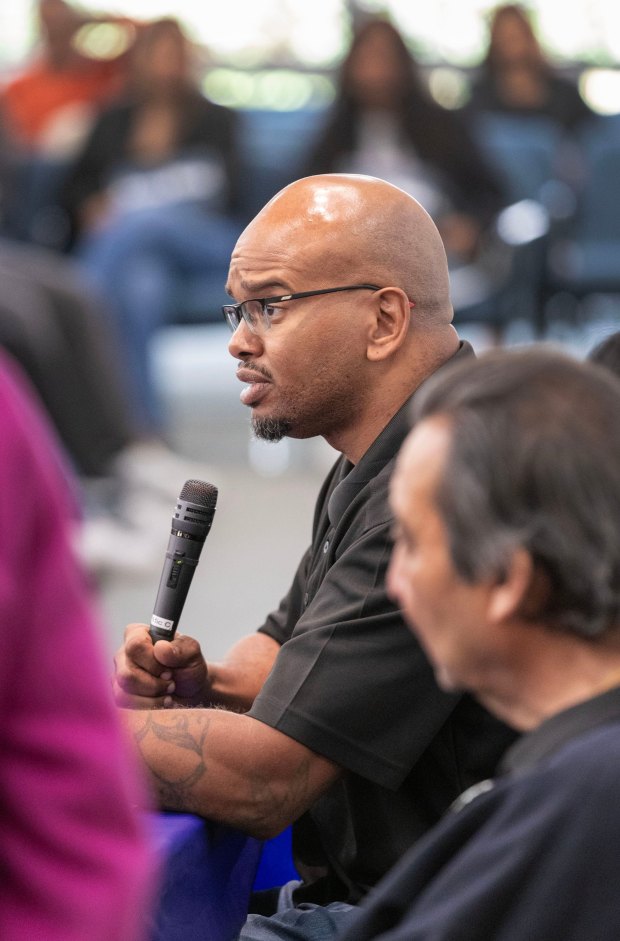 In the jury lounge of the Vista Courthouse convicted murderer Tony Hicks speaks to local high school students participating in the Youth In Court program. At lower right is Azim Khamisa, the father of Tariq Khamisa, the man Tony killed. (Charlie Neuman / For The San Diego Union-Tribune)