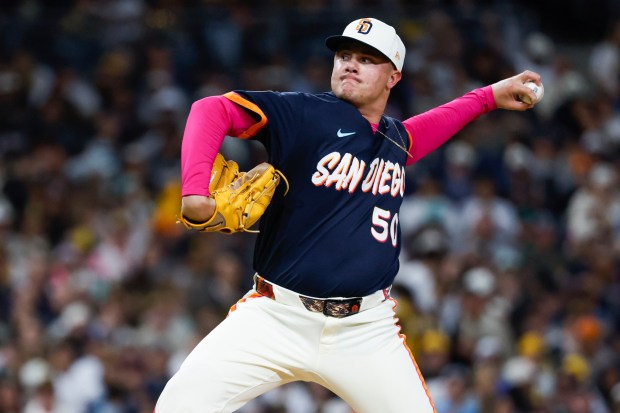 Adrian Morejon #50 of the San Diego Padres pitches against the Colorado Rockies during the eighth inning at Petco Park on Friday, April 10, 2026 in San Diego, California. (Meg McLaughlin / The San Diego Union-Tribune)