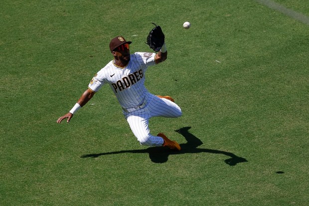 Padres outfielder Samad Taylor makes a catch in the eighth inning against the Reds on Wednesday. (Meg McLaughlin / The San Diego Union-Tribune)