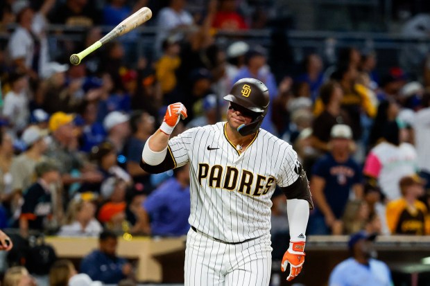 Ty France #25 of the San Diego Padres flips his bat after a home run against the Toronto Blue Jays during the sixth inning at Petco Park on Saturday, July 11, 2026 in San Diego, California. (Meg McLaughlin / The San Diego Union-Tribune)