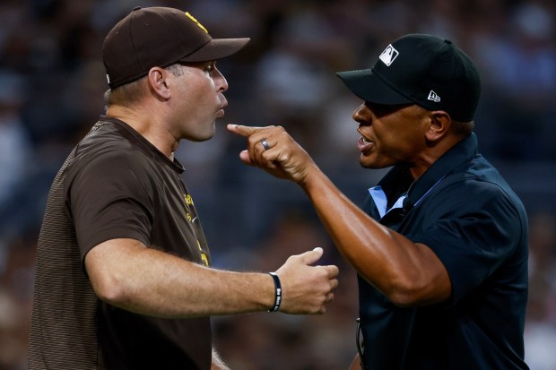 Craig Stammen #14 of the San Diego Padres argues with umpire Jeremie Rehak #35 during the fourth inning against the Colorado Rockies at Petco Park on Tuesday, July 28, 2026 in San Diego, California. (Meg McLaughlin / The San Diego Union-Tribune)