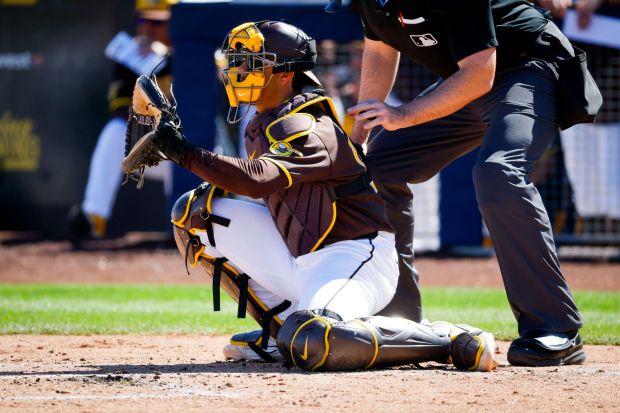 Ethan Salas of the San Diego Padres catches during their spring training game against Great Britain at Peoria Sports Complex on Wednesday, March 4, 2026 in Peoria, Ariz. (Meg McLaughlin / The San Diego Union-Tribune)
