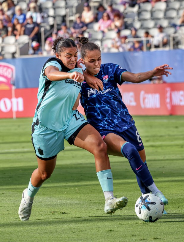 SD Wave's Gabi Portilho battles for the ball against NY/NJ -Gotham FC's Jess Carter during match at Snapdragon Stadium on Friday, July 4, 2026. (Photo by Sandy Huffaker for The San Diego Union-Tribune)