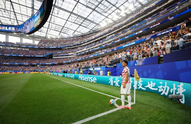 U.S. midfielder Malik Tillman takes a corner kick against Paraguay during their World Cup Group D match in Inglewood on June 12. (K.C. Alfred / The San Diego Union-Tribune)