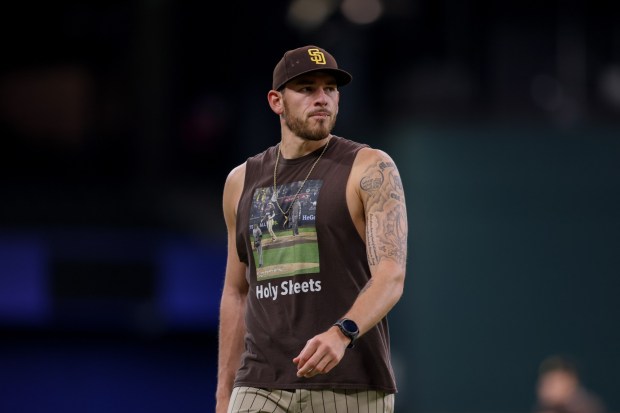 San Diego Padres pitcher Joe Musgrove walks the field before a baseball game against the Texas Rangers, Sunday, June 21, 2026, in Arlington, Texas. (AP Photo/Gareth Patterson)