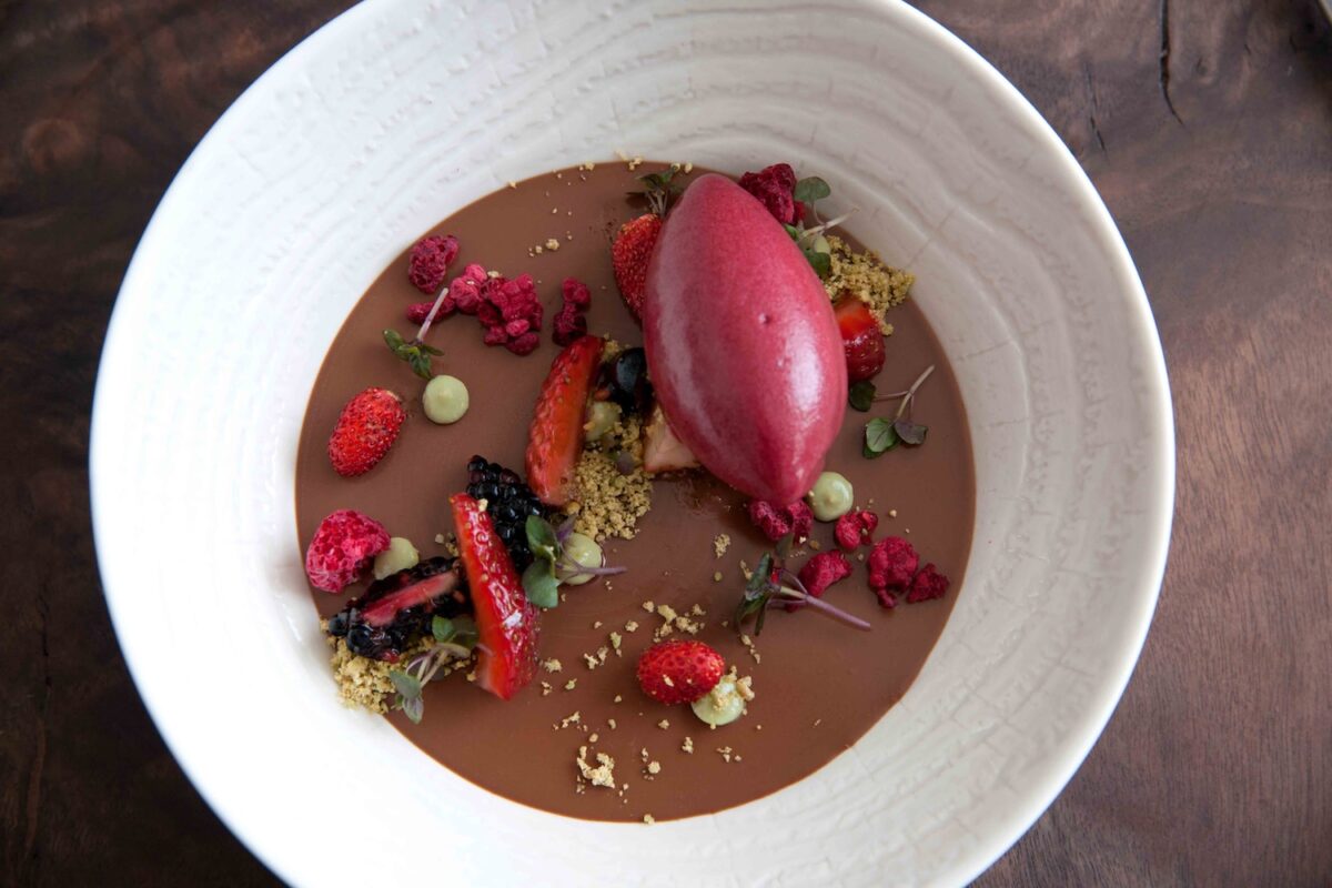 Club Hue's Saikyo miso cremeux, blackberry sorbet, Iranian pistachios and red shiso