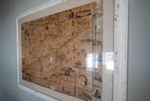 A vintage map of LBI has graced the walls of the home since its early days, once actually glued to the wall.