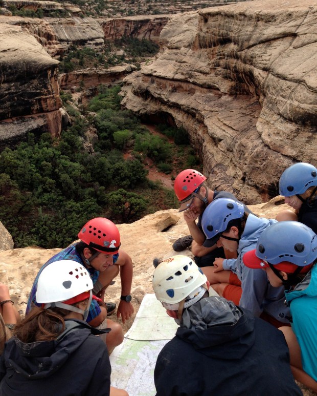Campers study a map at Colorado Outward Bound School.map at Colorado Outward Bound School in 2022. (Peter O'Neil, provided by Outward Bound)