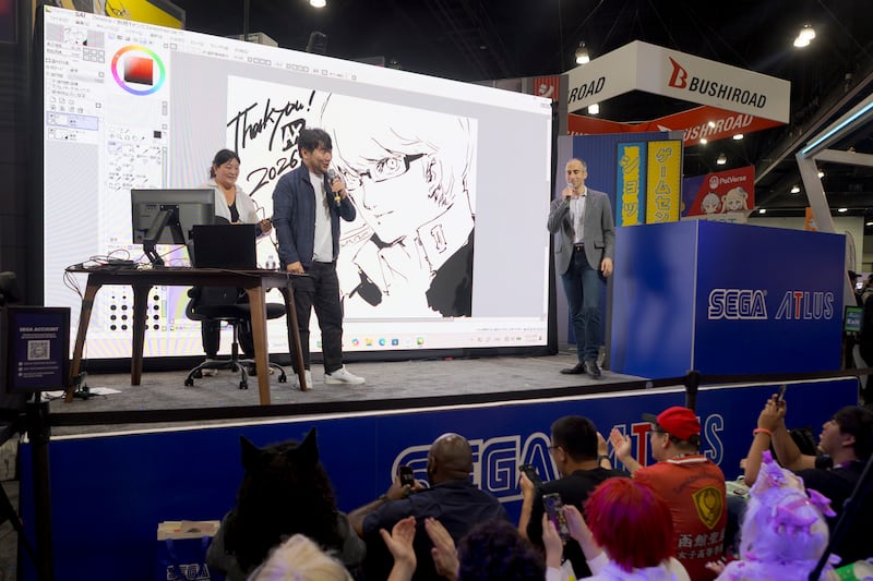 Artist talking to a crowd