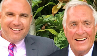two men in suit and tie