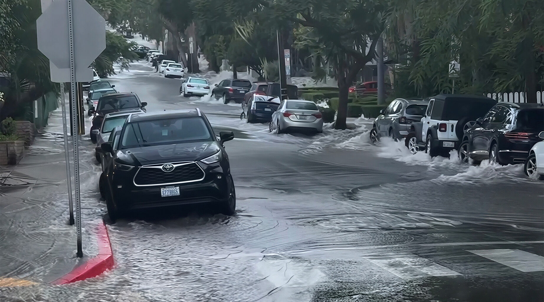 Flooding on Cynthia Street in West Hollywood due to century old water main bursting on July 16, 2026.