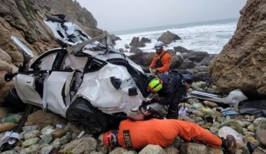 FILE - In this photo provided by the San Mateo County Sheriff's Office, emergency personnel respond to a vehicle over the side of Highway 1 on Jan. 1, 2023, in San Mateo County, Calif. (Sgt. Brian Moore/San Mateo County Sheriff's Office via AP, File)