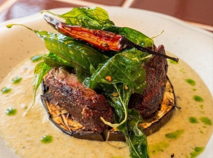 Thai green curry beef cheek in a pale brown sauce