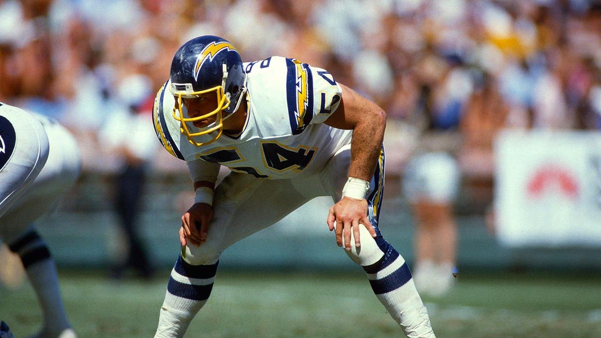 Billy Ray Smith #54 of the San Diego Chargers in action during a football game.