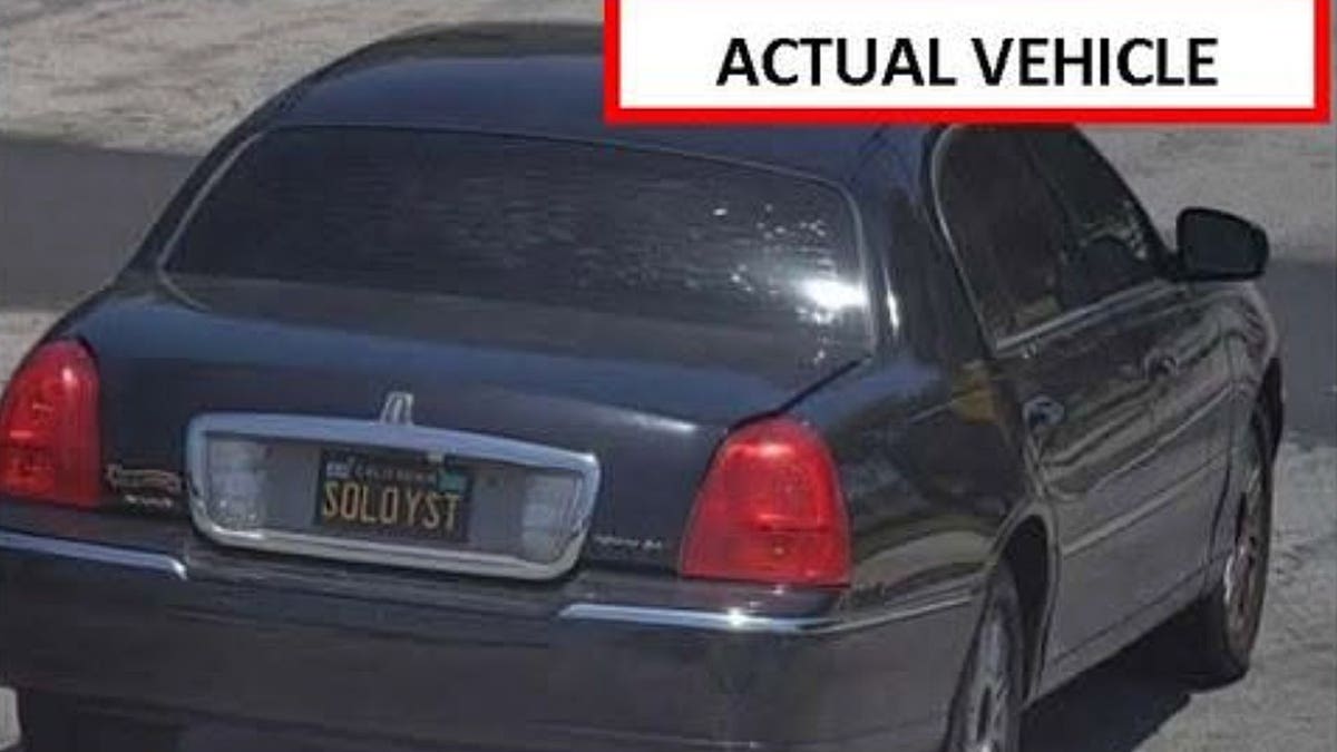 2011 Lincoln Town Car with California license plate SOLOYST